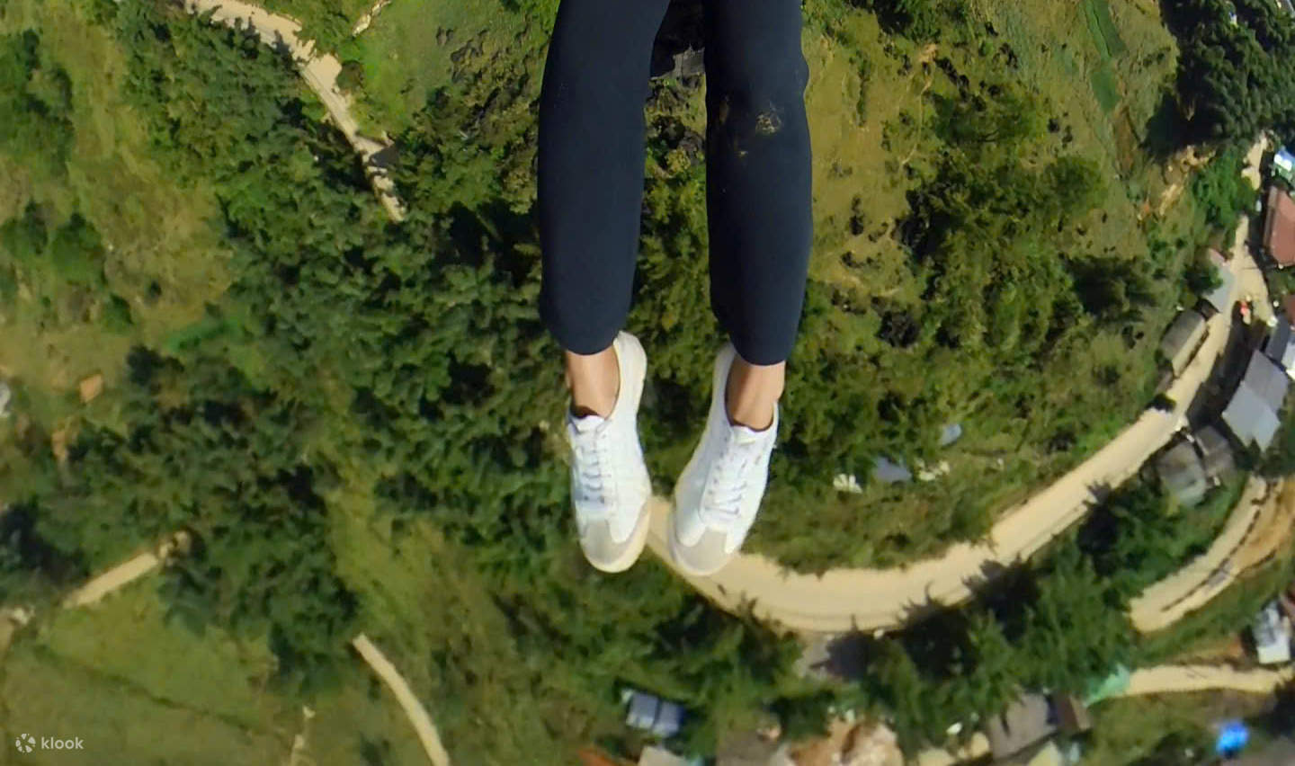 サパでのパラグライダー体験 - ホテル送迎付き