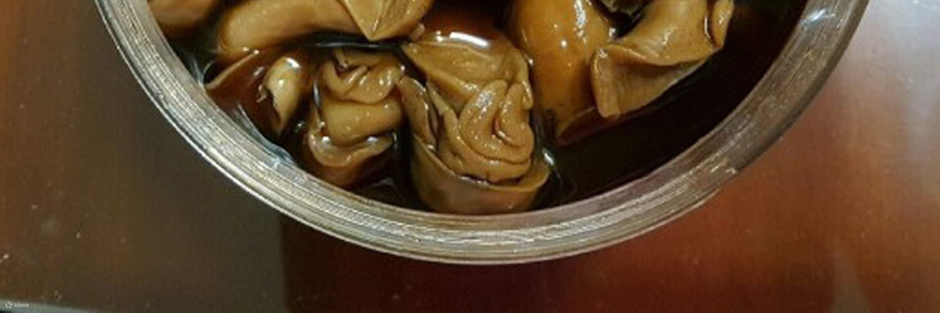 Caracol de mar marinado en salsa de soja