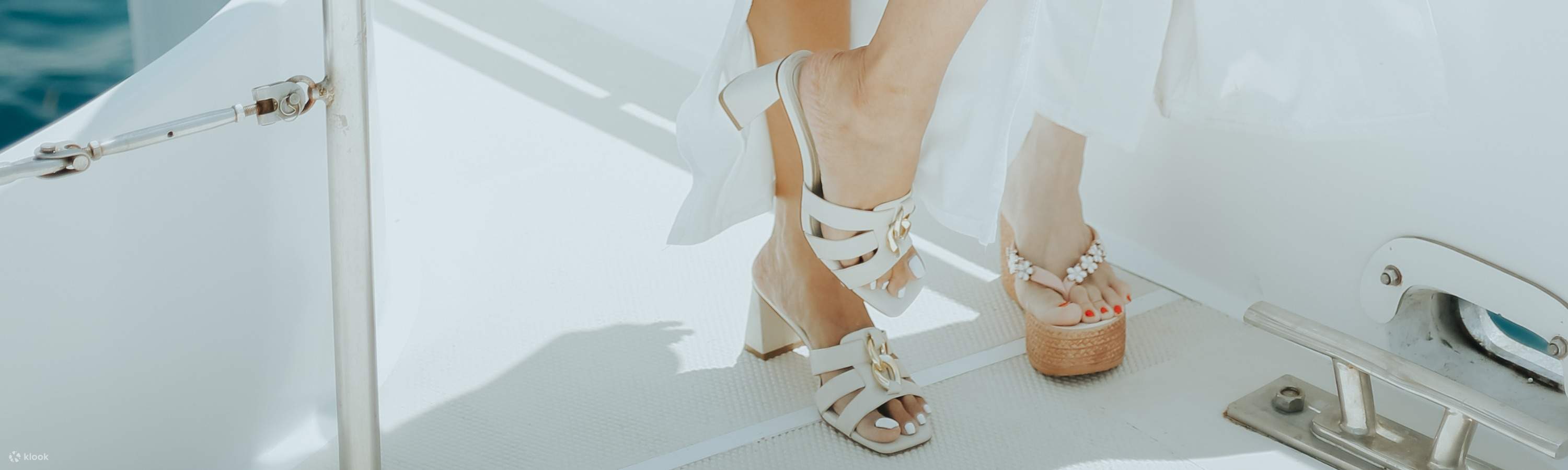 ladies drinking cocktail on a yacht