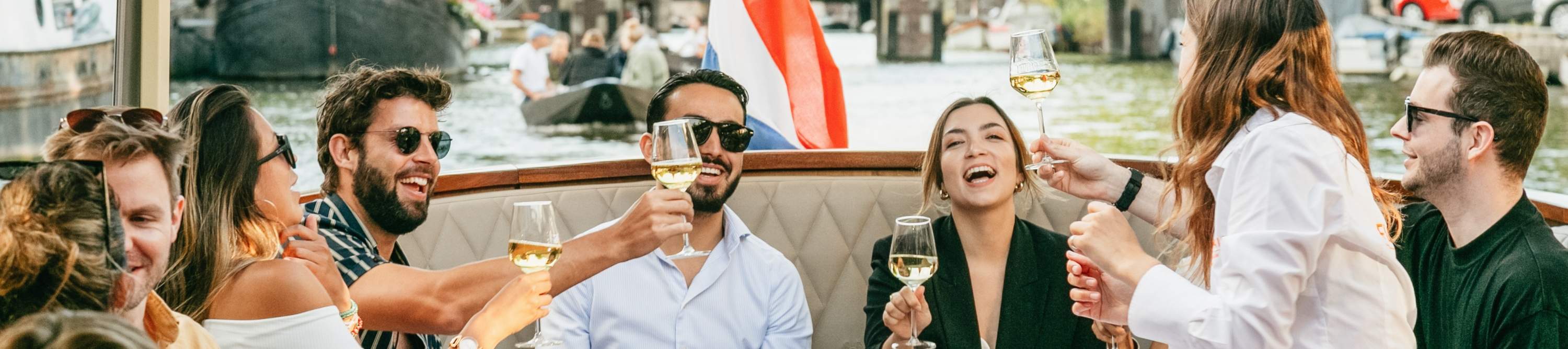 Amsterdam Luxury Saloon Boat Canal Cruise Tour with Wine and Cheese Klook
