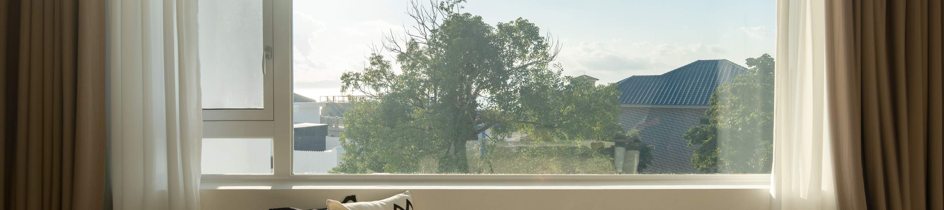 Bâtiment J · Chambre Lits Jumeaux - Vue Latérale sur Mer J205