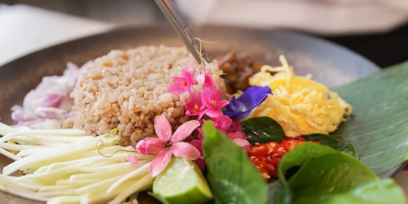 Shrimp paste rice served along with hand crafted greens at Khao Jaan-Prod 