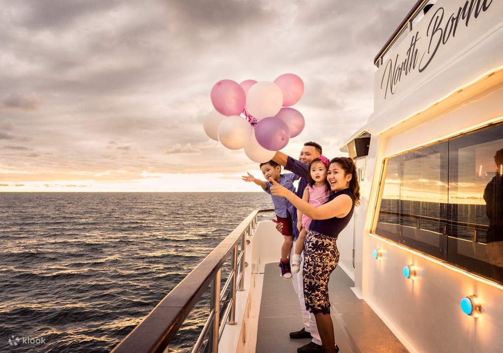 watch the sunset while relishing delicious meals on a dinner cruise