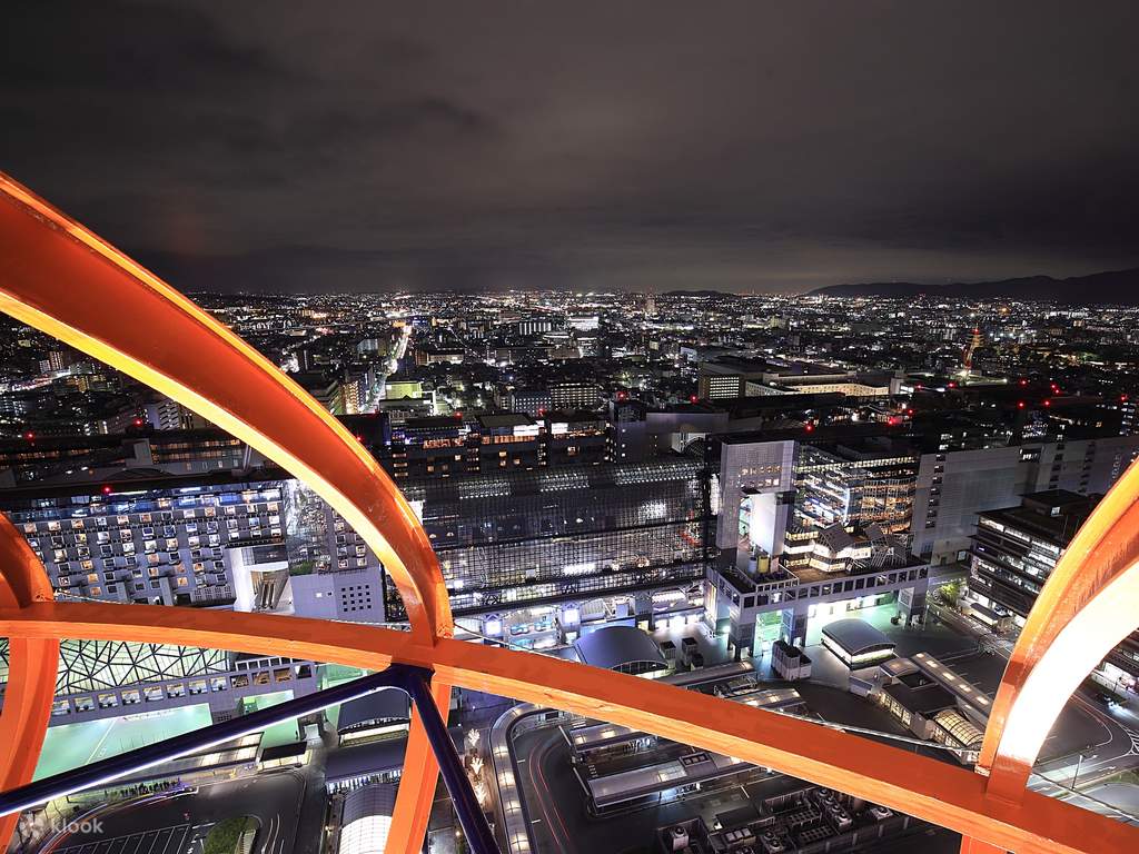 enjoy the glittering view from kyoto tower