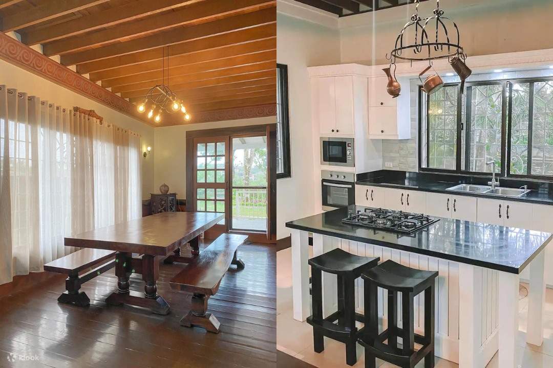 Cuisine contemporaine avec table à manger et îlot central, électroménager en acier inoxydable