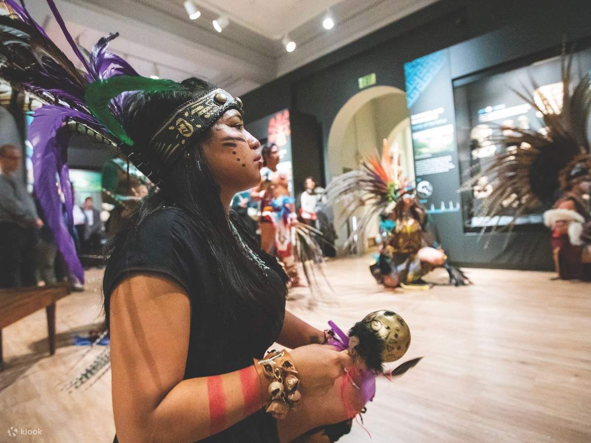 A museum guide narrating the significance of an artifact to engaged children