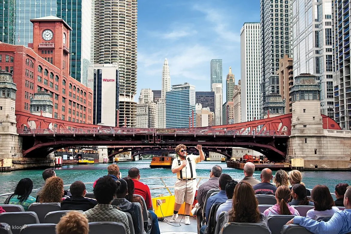People listening to a guide on a cruise