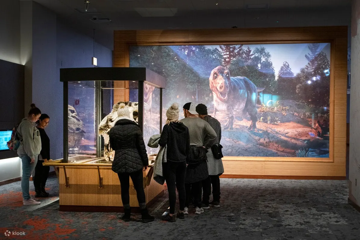 People looking at a fossil