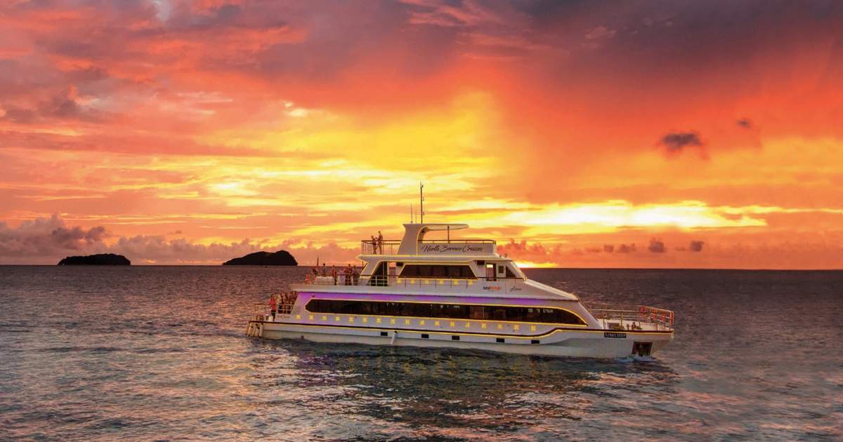 watch the sunset while relishing delicious meals on a dinner cruise
