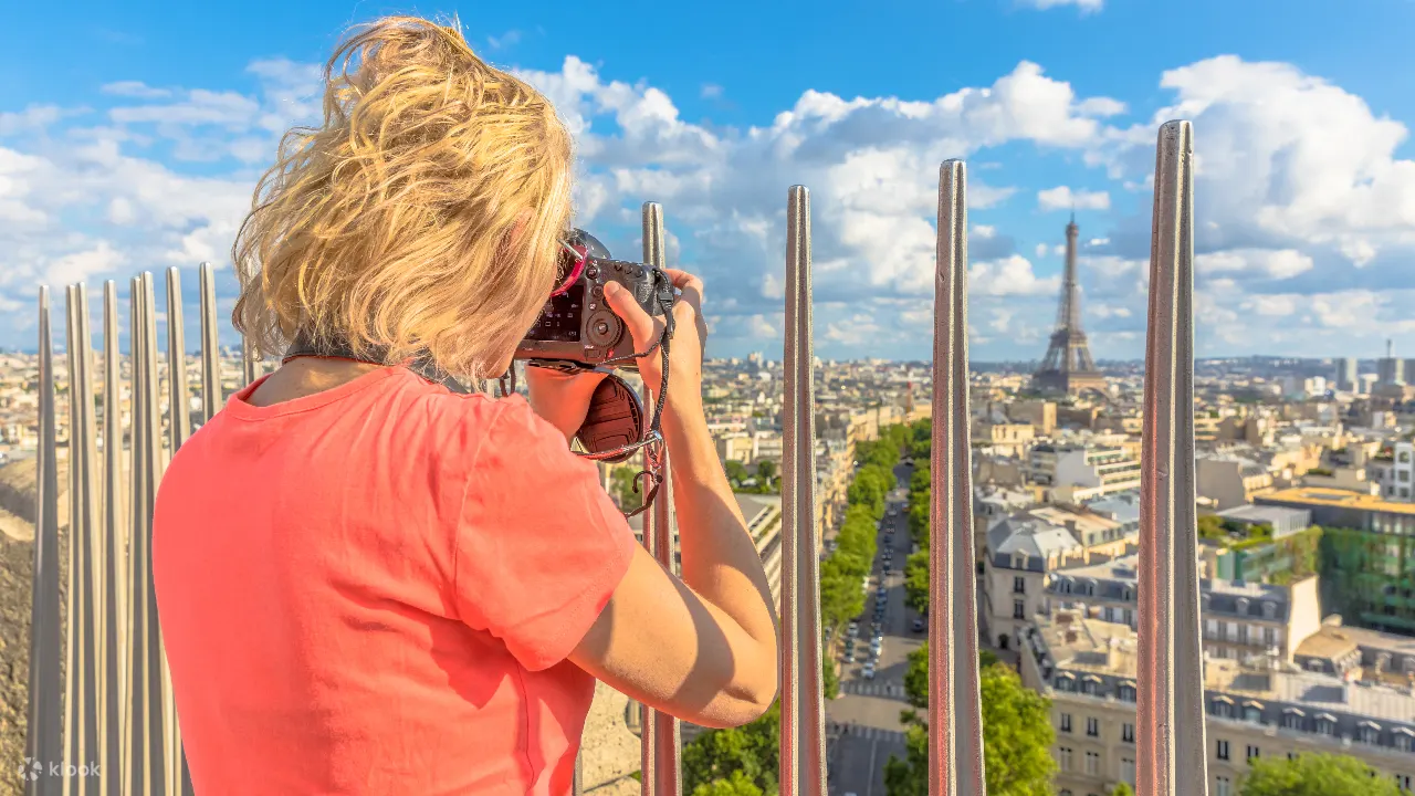 Climb to the top of the Arc de Triomphe for sweeping views of Paris