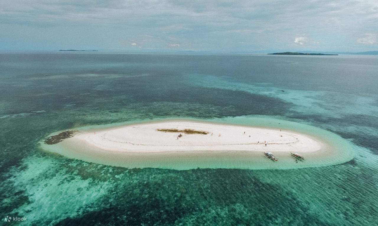 Excursión de un día a la isla Daku, la isla Guyam y la isla Naked