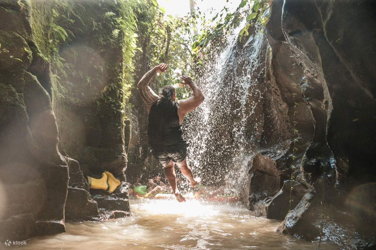 Take a refreshing break under a hidden jungle waterfall