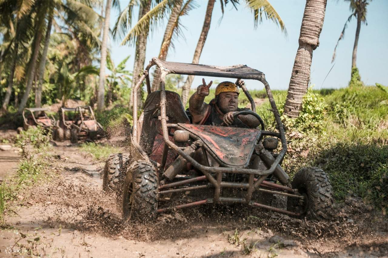 Thrill begins as adventurers rev up their buggies through lush Bali trails