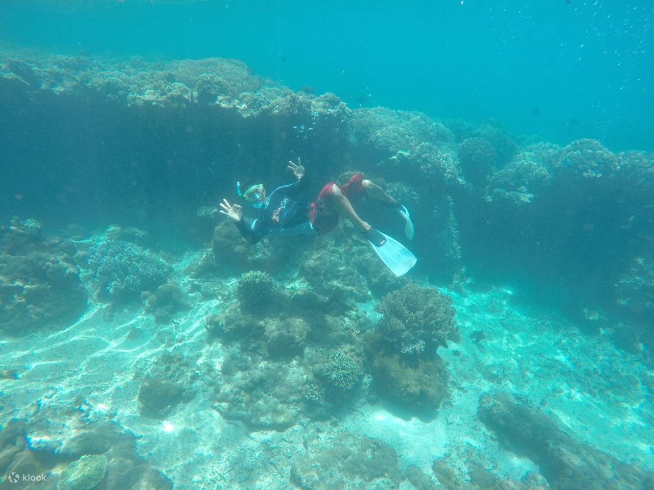 a person snorkeling at Labuhan Amuk Beach