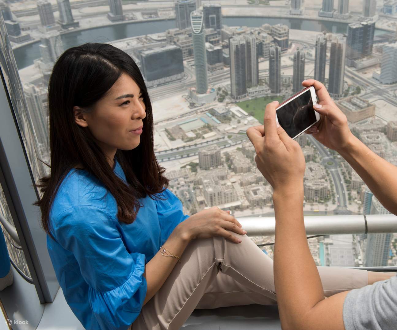 Take a picture from the Burj Khalifa observation deck