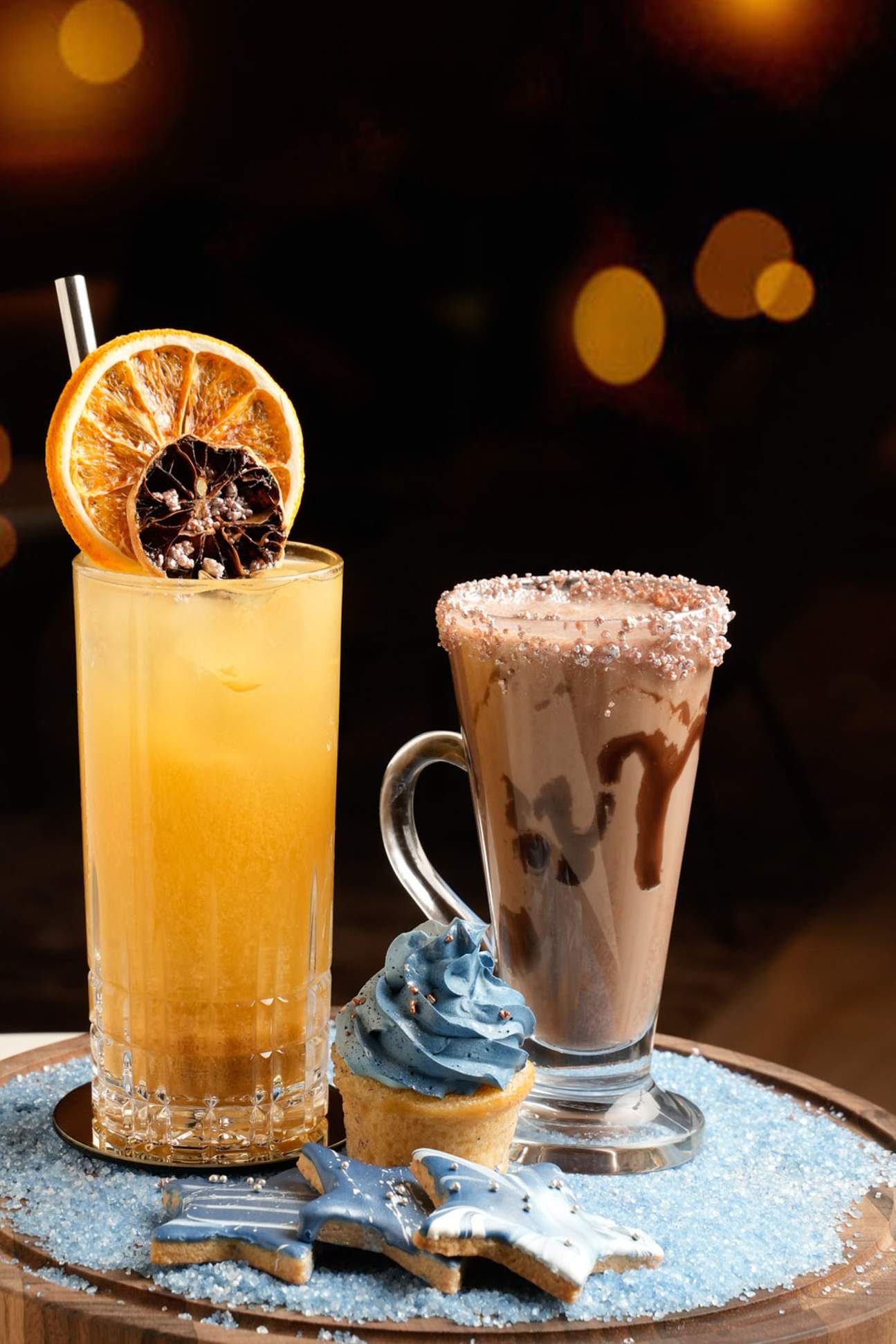 Savour a Signature welcome drink for adults and Mini Milkshake & Cookie or Cupcake for children