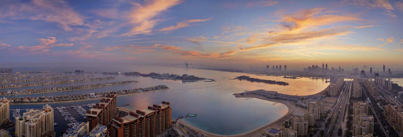 Capture scenic beauty of the sunset by Burj Al Arab.
