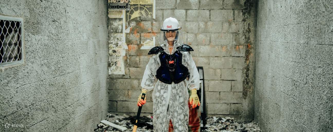 A protected woman with safety equipment in The Smash Room