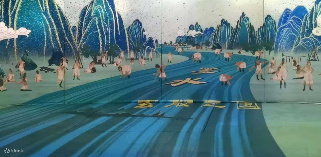 El escenario utiliza efectos de luces y sombras para recrear escenas de la vida tribal antigua, como si transportara al público a tiempos prehistóricos para sentir la simplicidad y el misterio de aquella época.