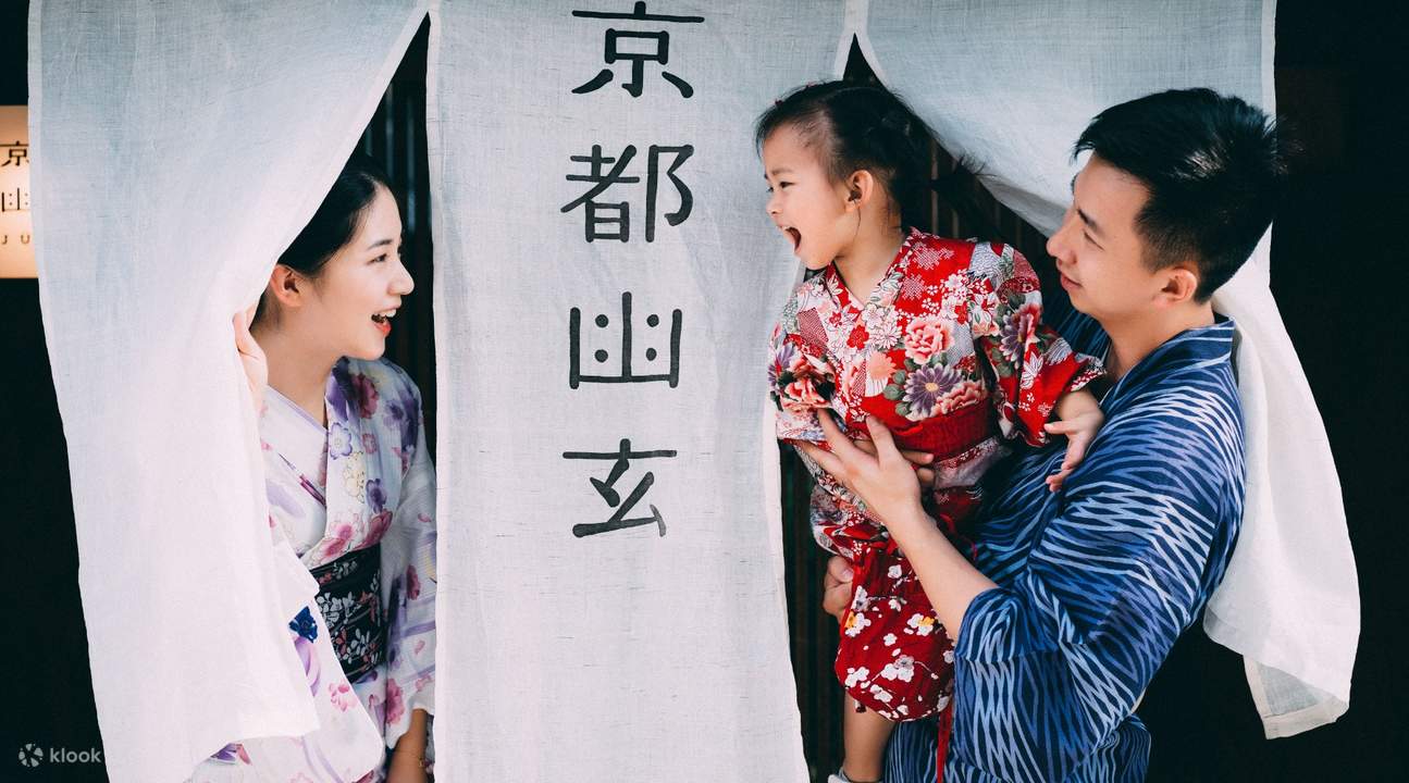 a family wearing kimono