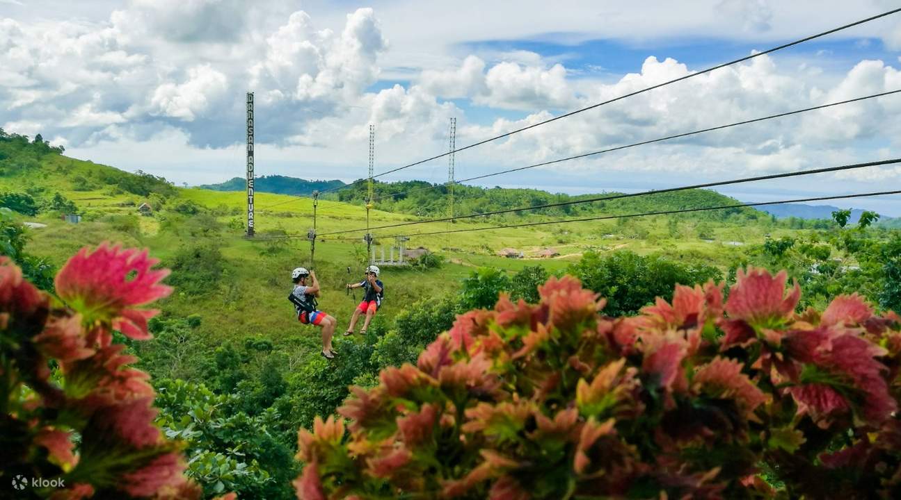 two persons on a zipline at danasan eco adventure park