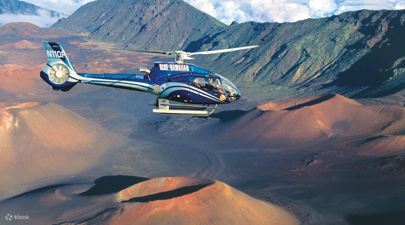 Helicopter flying over mountains