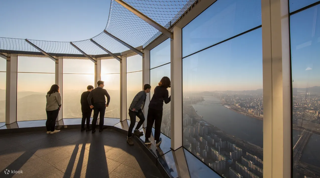 people admiring the views at seoul sky