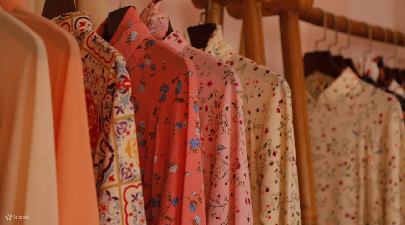 different colored ao dais on hangers in ho chi minh city