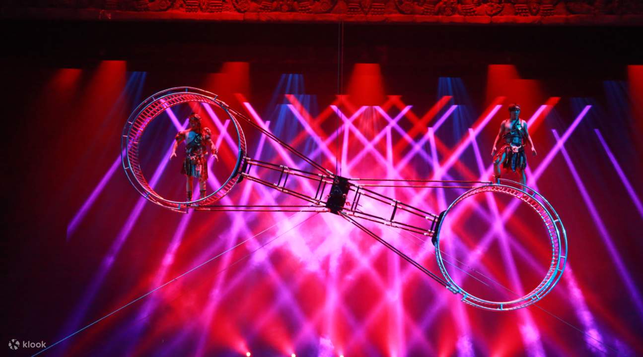 a scene in the angkor dynasty show featuring men rolling barrels