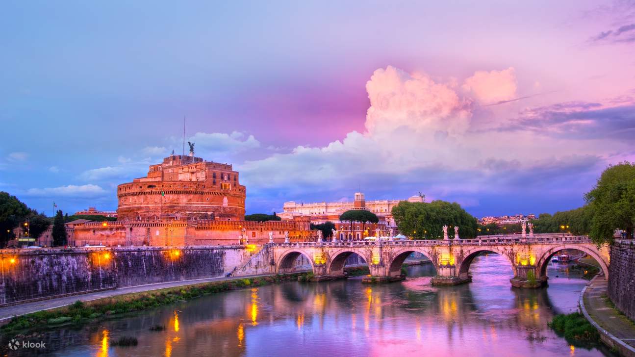 Majestic Castel Sant’Angelo overlooking the Tiber River, blending ancient history with breathtaking Roman views