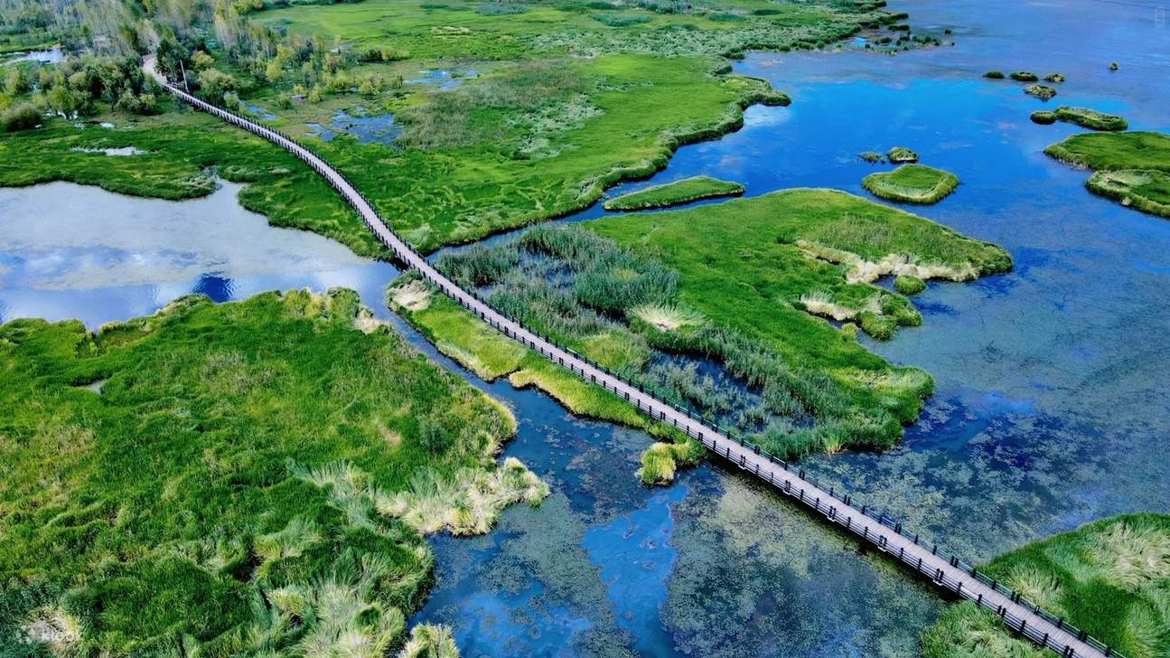 Yunnan Lugu Lake High-end Two-Day Tour (Lugu Lake + Liwubi Island + Walking  Marriage Bridge + Visiting Mosuo Folk Customs + Bonfire Party + Lake View  Hotel + Optional Cruise to Enjoy