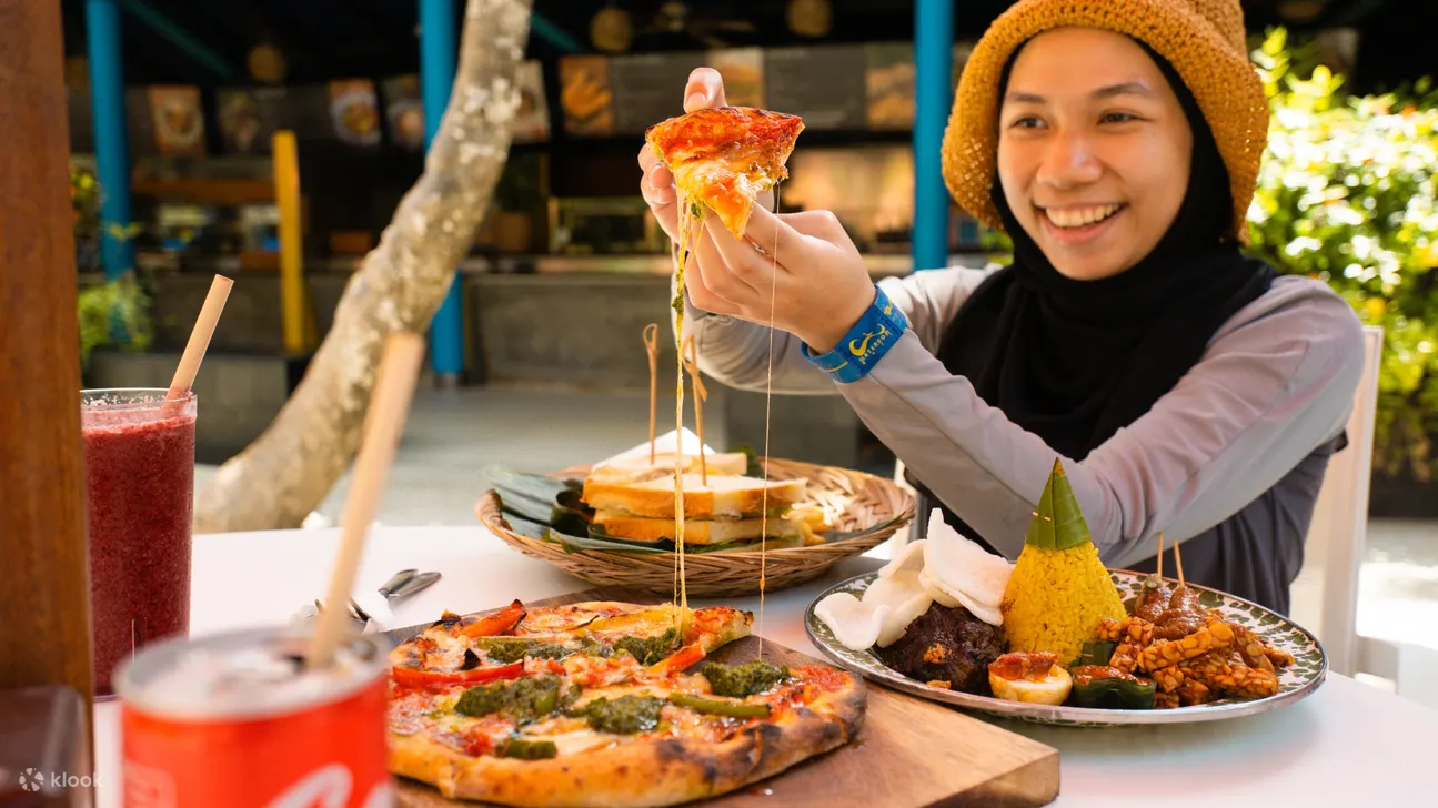 girl eating pizza