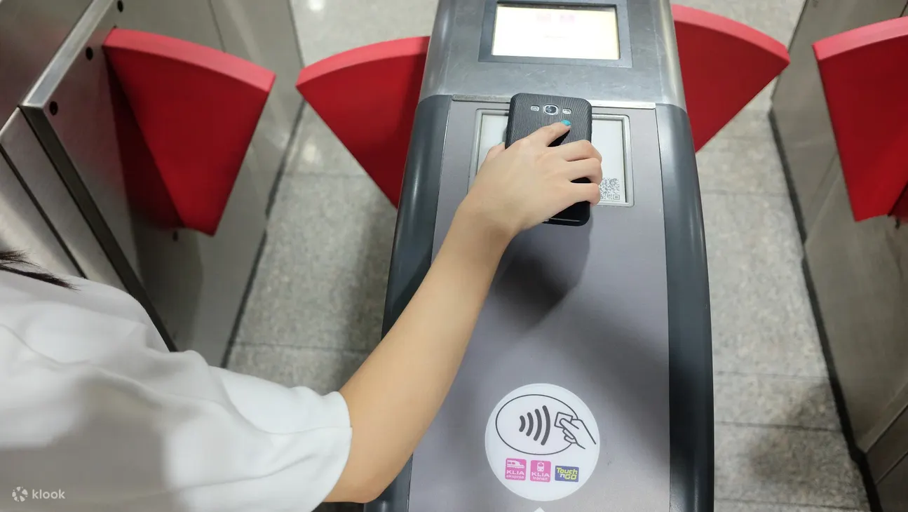 Scan the QR code received in voucher at the gate turnstile