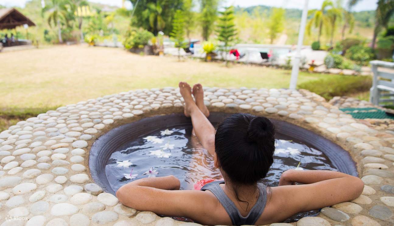 woman on a kawa hot bath