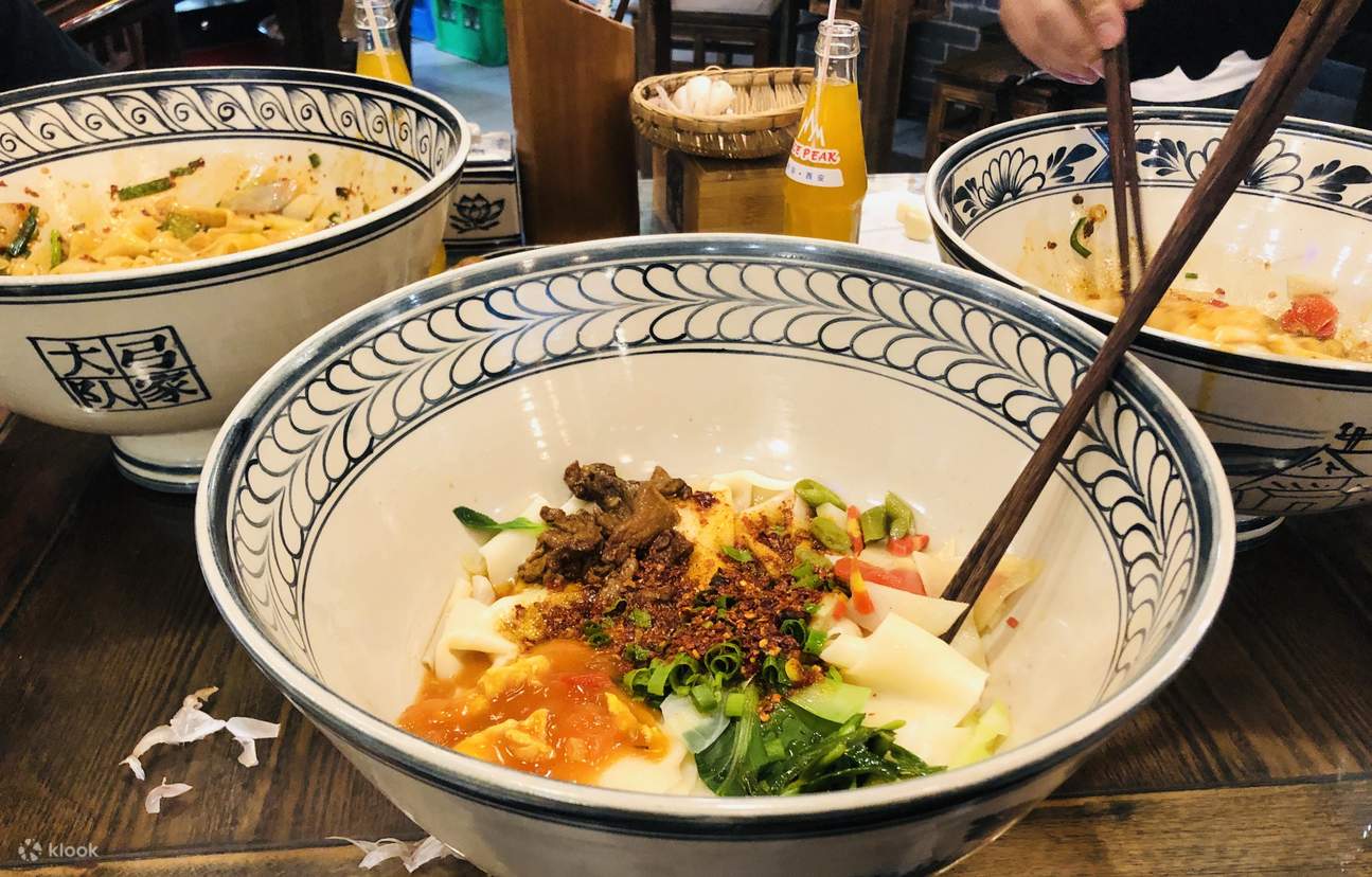 คลาสเรียนทำบะหมี่ Biang Biang ในซีอาน พร้อมเยี่ยมชมตลาด - Eatwith