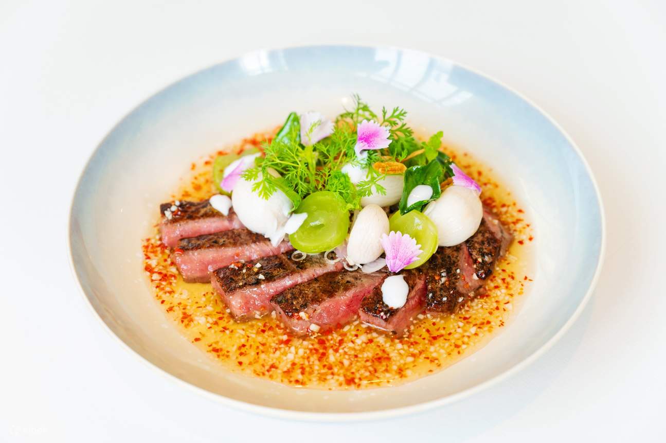 Pla style beef steak salad with fresh mint, grapes and mangosteen