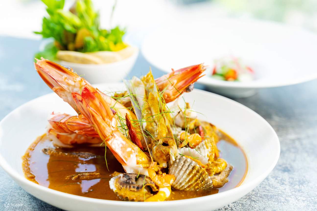 From southern Thailand, a gentrified version of gaeng tai pla with razor clams, cockles, tiger prawns, black pepper & tamarind