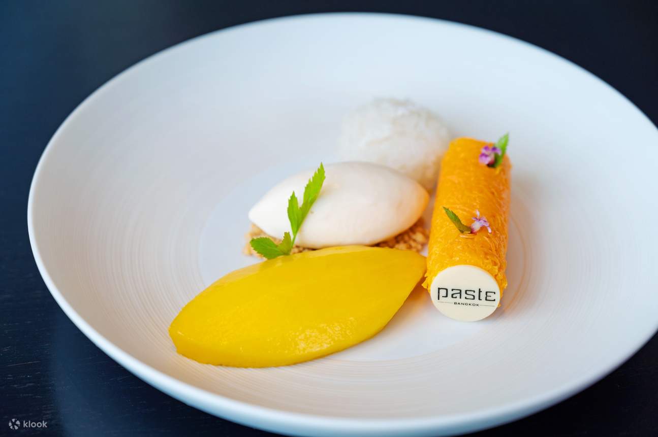 'Nam Dok Mai' mango mousse, sticky rice with golden threads & in-house made coconut ice-cream