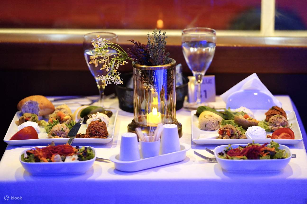 Experience a Bosphorus Dinner Cruise with exquisite cuisine and stunning waterfront views