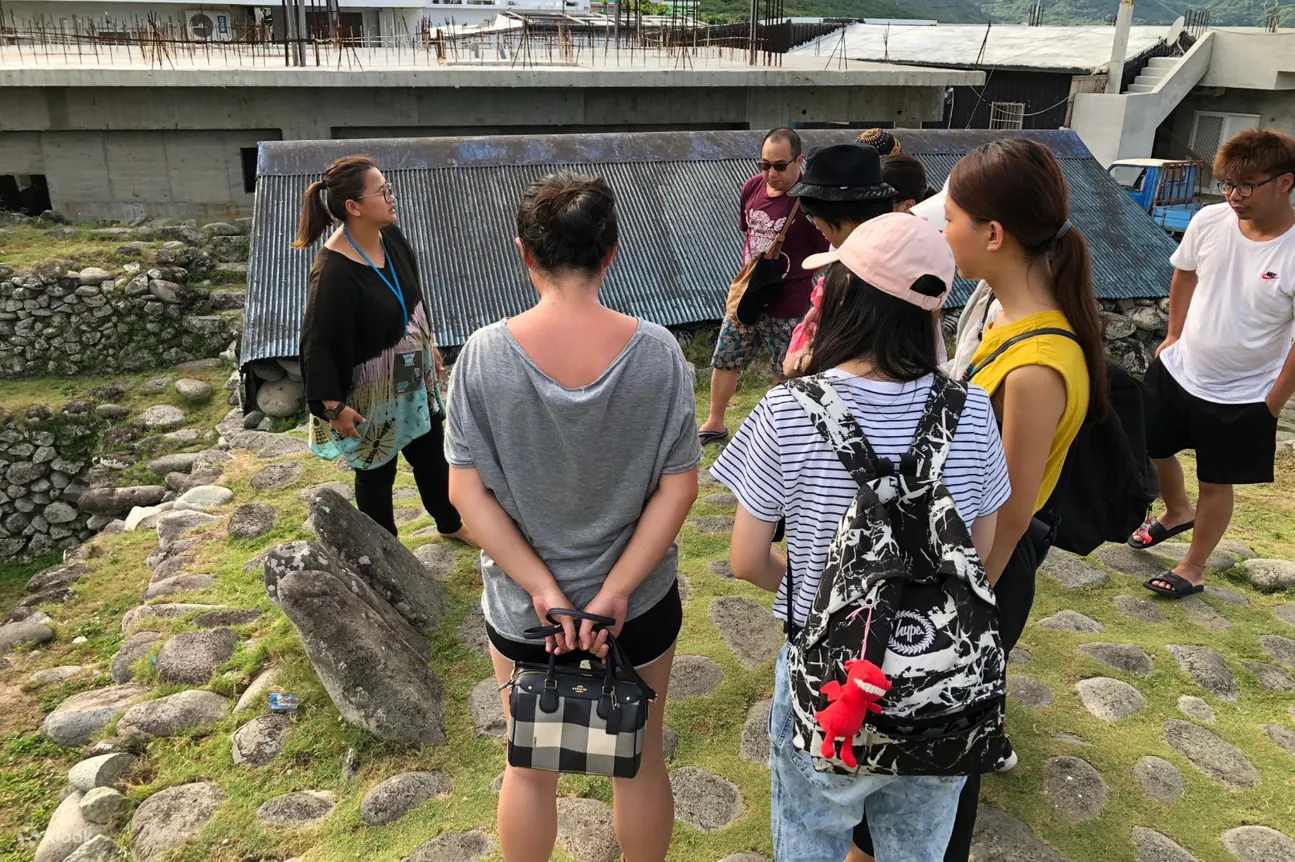 a guide talking to visitors