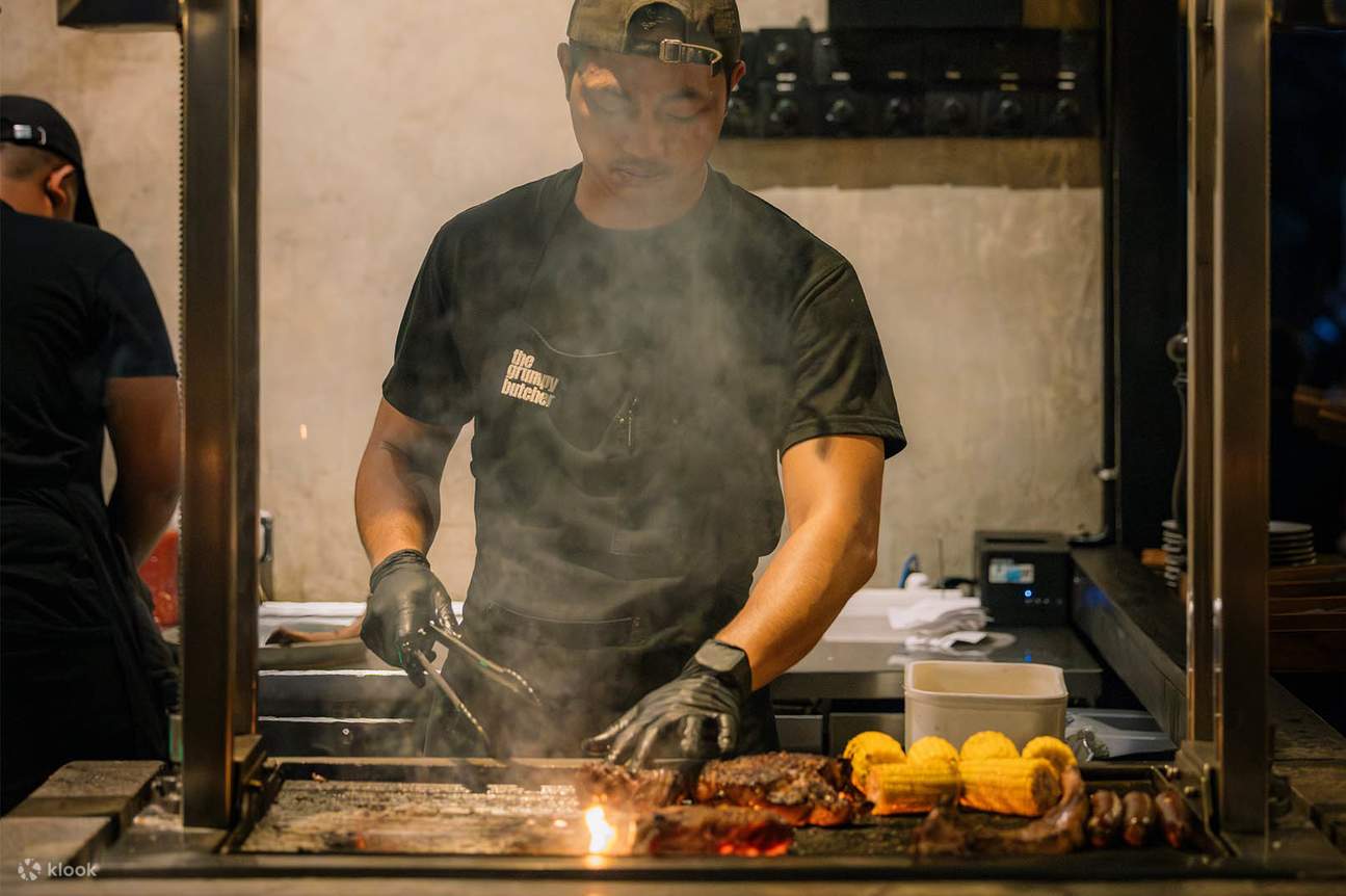 The heart of The Grumpy Butcher: a smoky grill, bold flavors, and chefs who live for the sizzle.