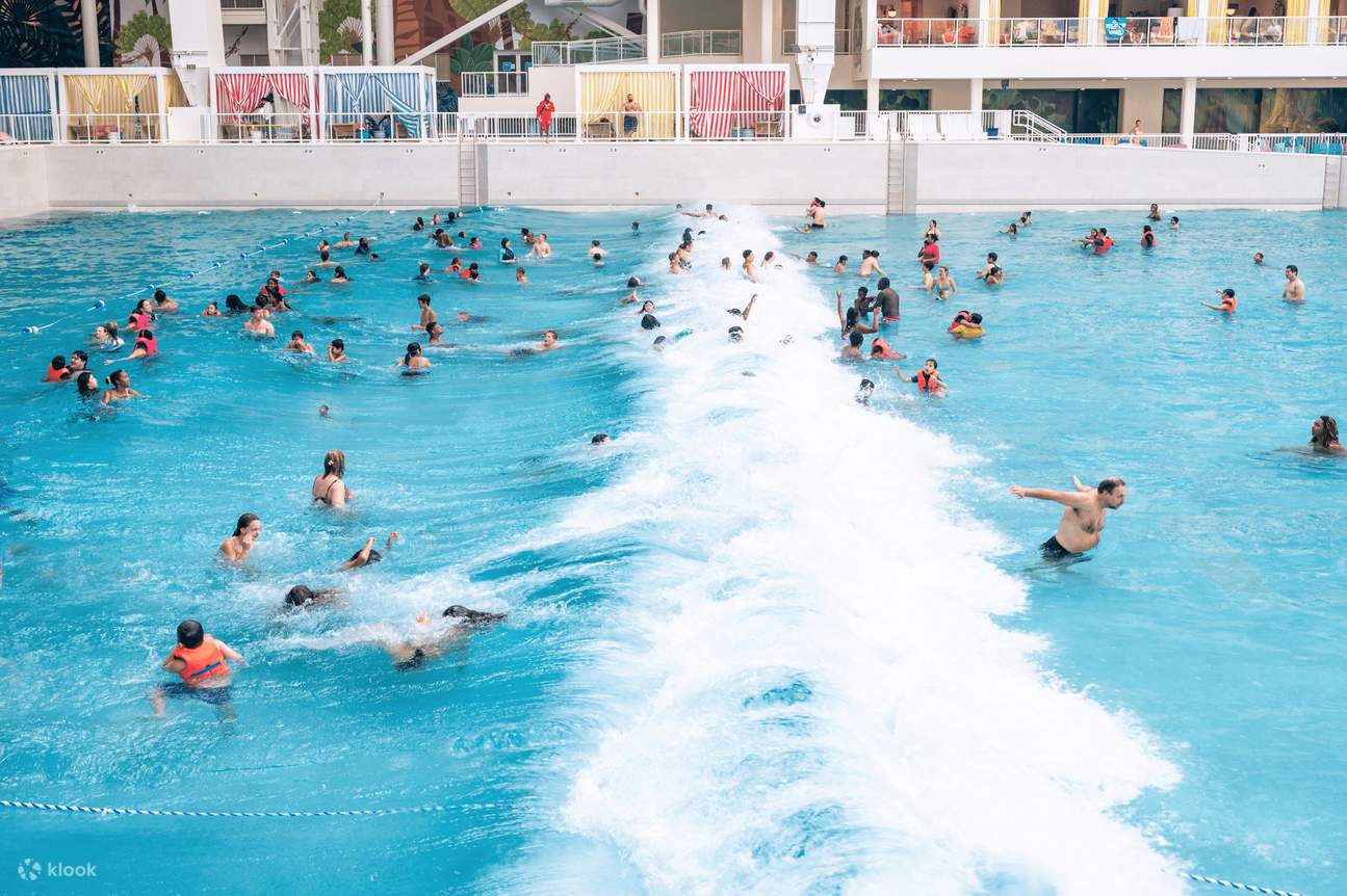 Relax in the world's largest indoor wave pool or on comfortable sun-loungers