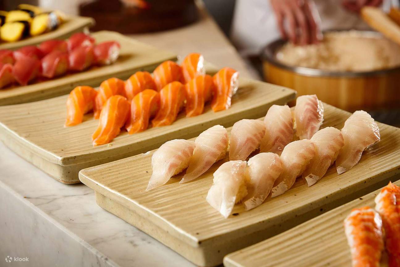Japanese dishes (sushi and salmon) at La Seine Buffet Restaurant at Lotte Hotel World
