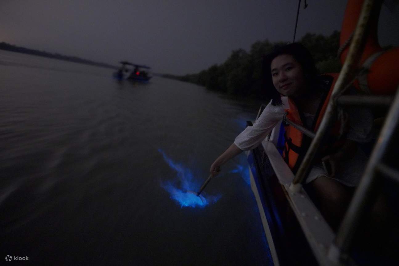 a person posing for a photo with the Blue Tears of the river