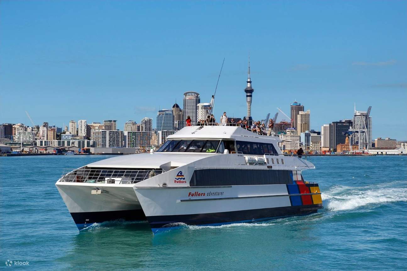 a catamaran departs from Auckland