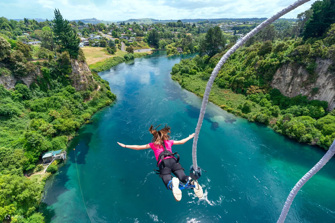 Woman jumping from Taupo Bungy New Zealand