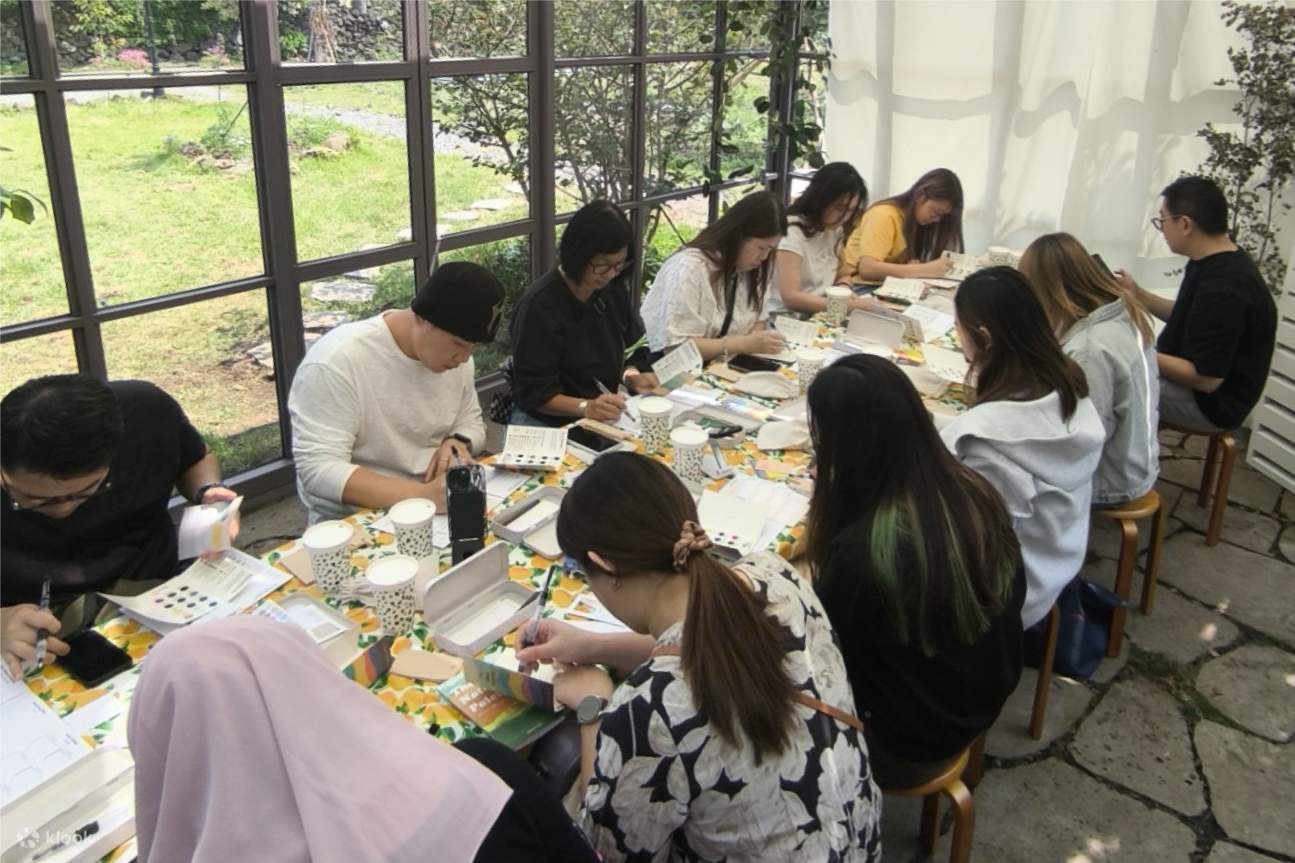 This greenhouse is part of the garden and serves as a workshop space for participants, accommodating up to 12 people.
