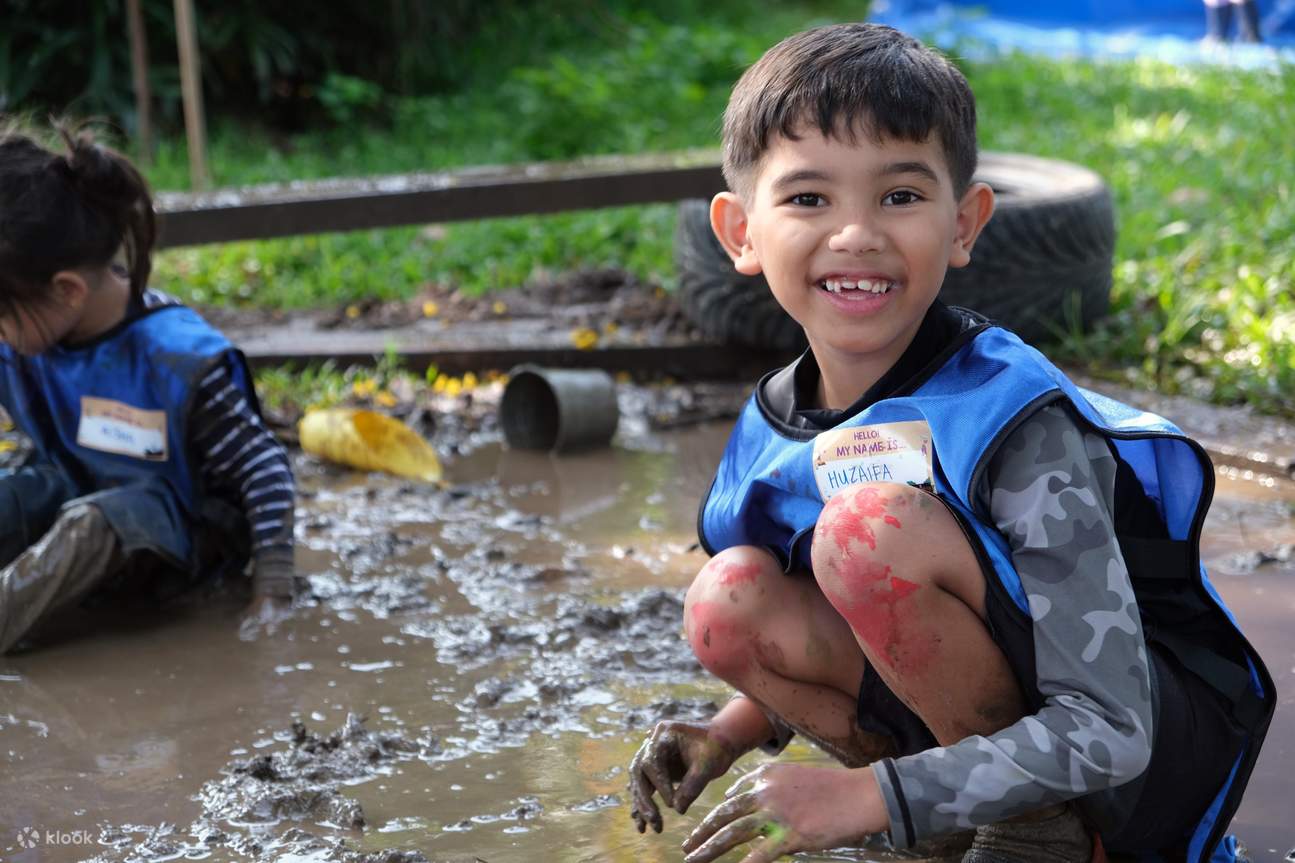 Happily playing with mud