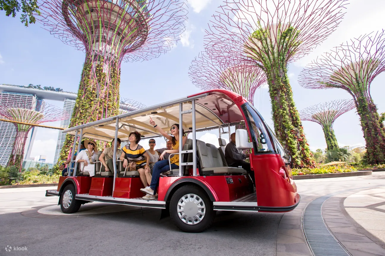 people on an audio tour on a tram supertree