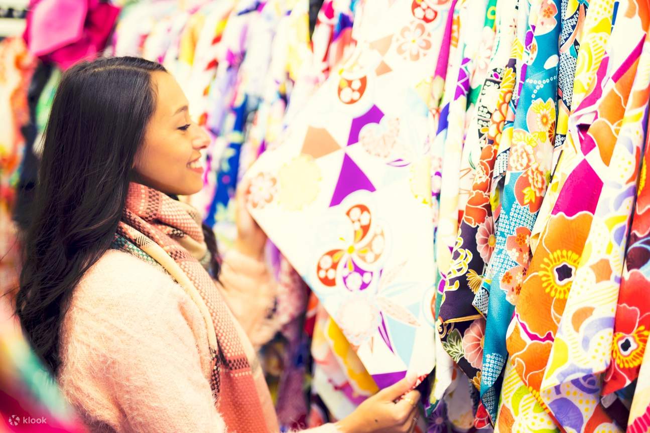 tourist choosing a kimono at the shop